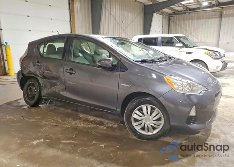 2014 Toyota Prius C z USA, uszkodzony, nr VIN JTDKDTB33E1072009